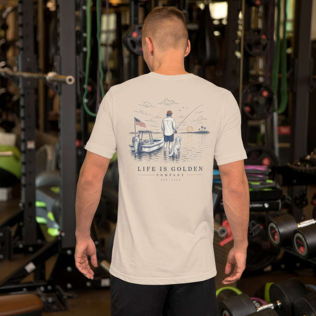 The Last Cast Tee — men's lifestyle, back (Soft Cream)