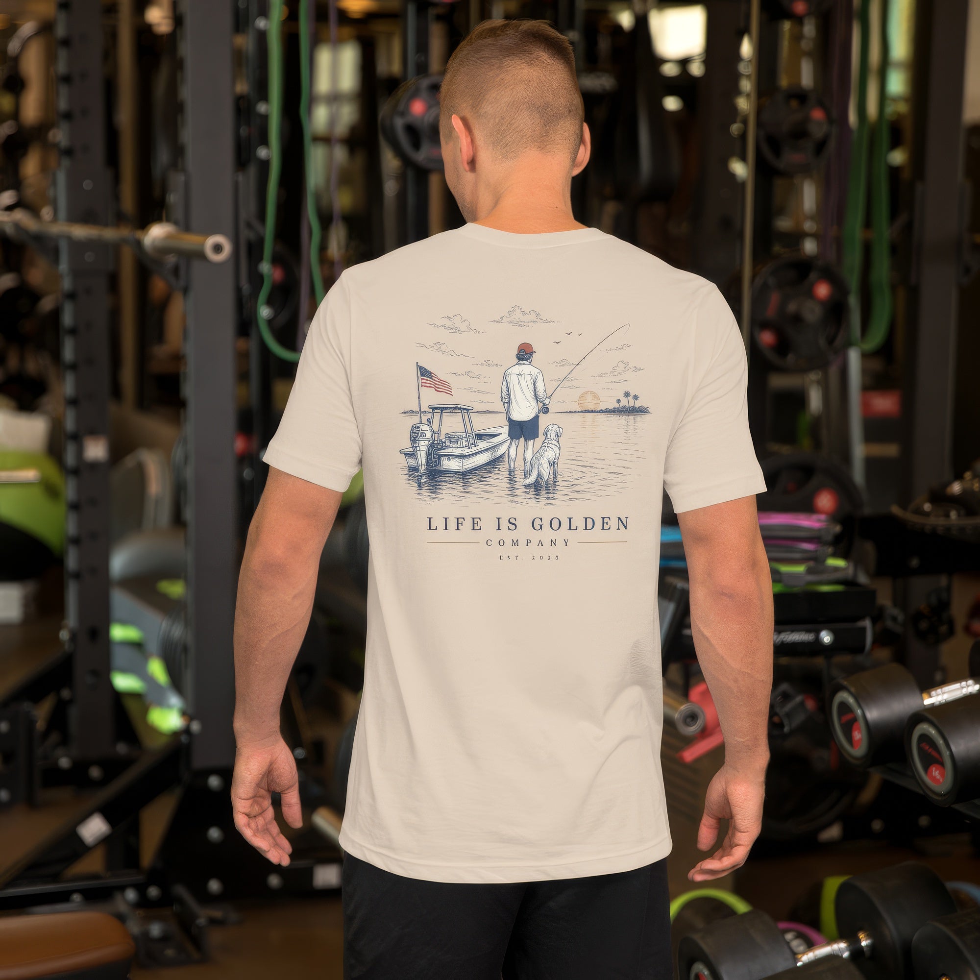 The Last Cast Tee — men's lifestyle, back (Soft Cream)