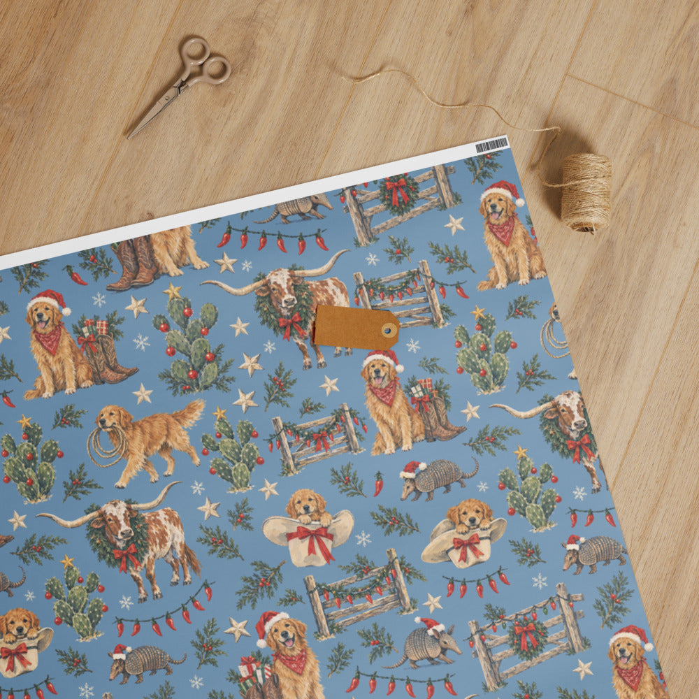Lone Star Christmas Wrapping Paper — unrolled on the table with scissors, twine and a gift tag