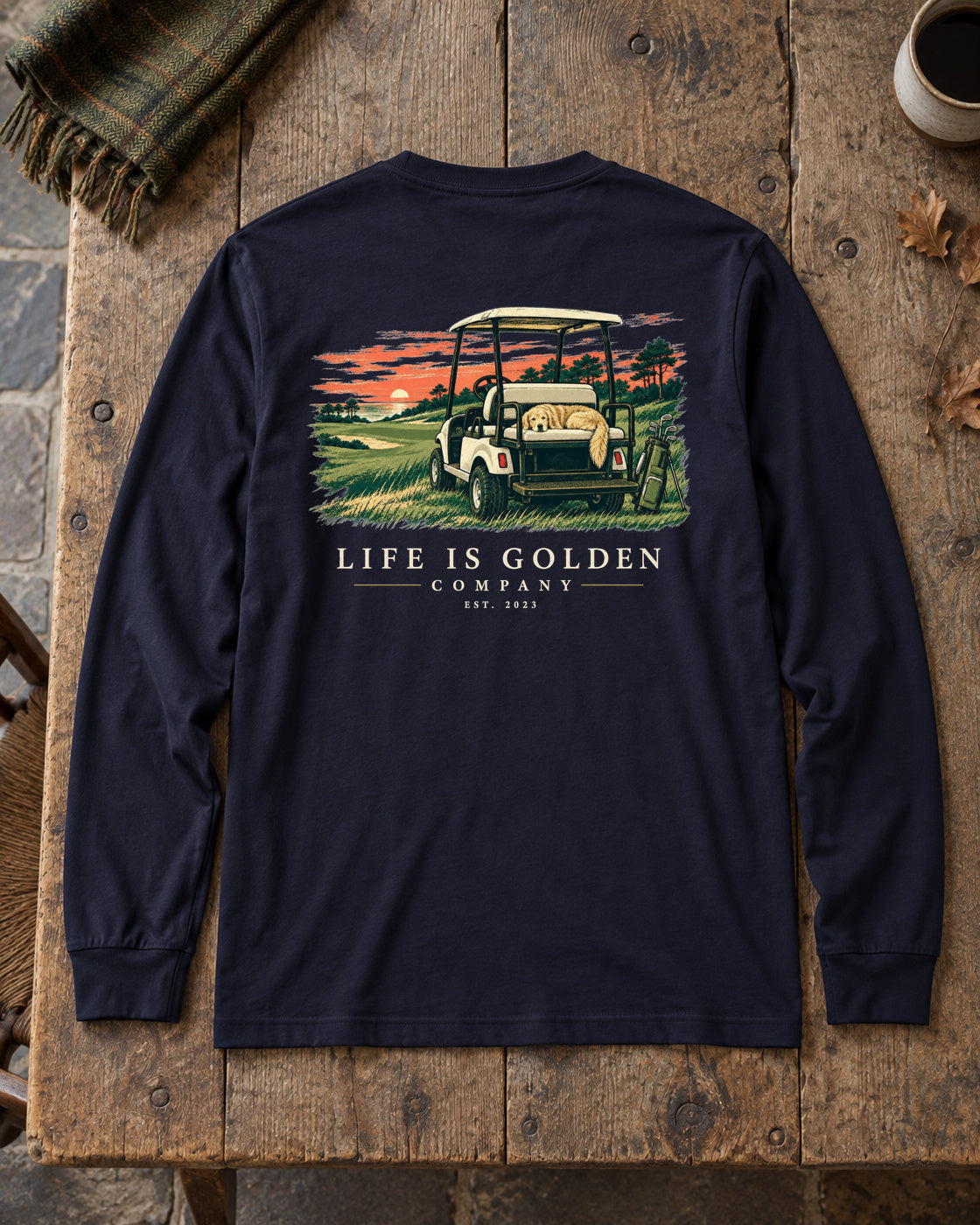 Sunset Cart Nap Long-Sleeve — lifestyle flat lay — October 2026