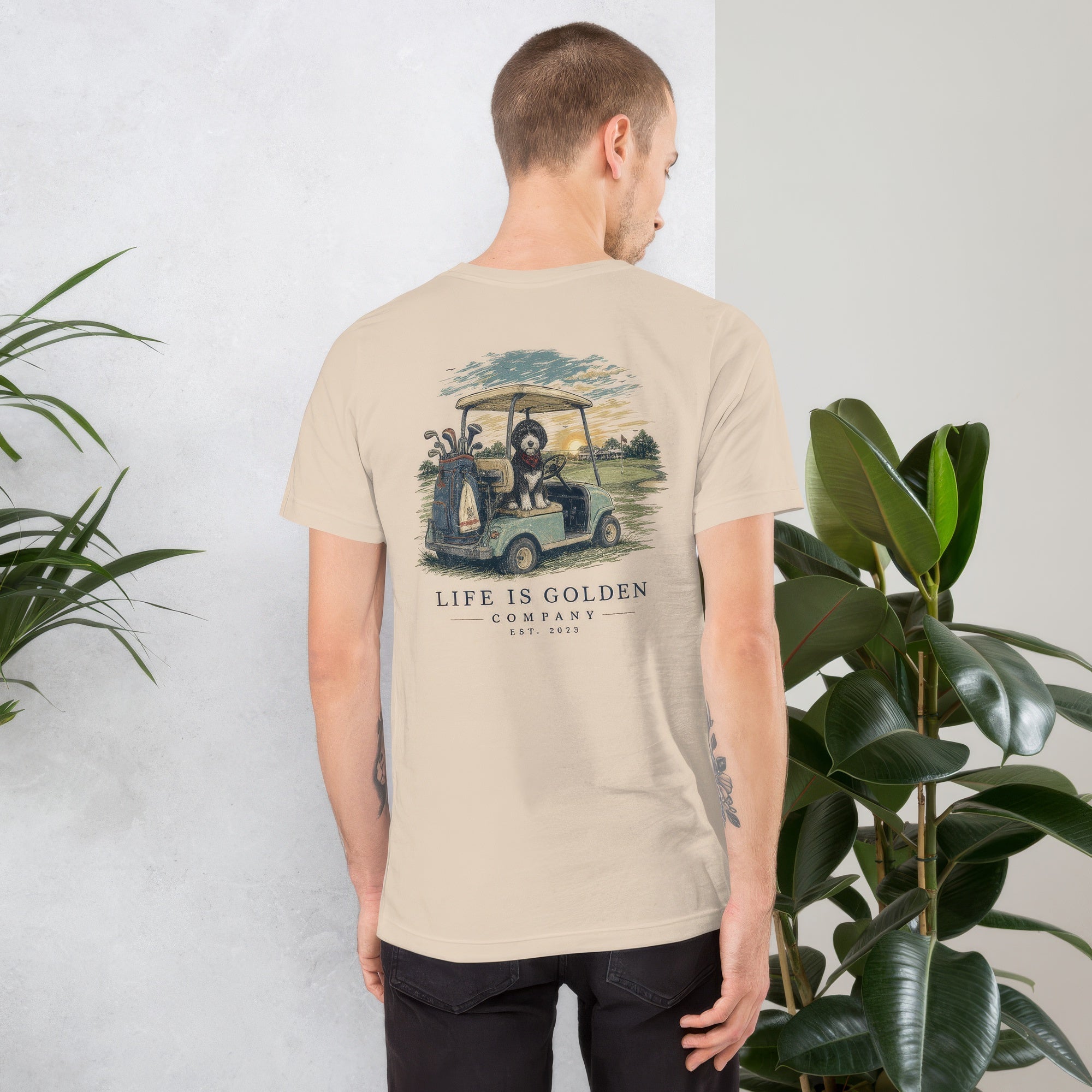 Twilight Loop — Men's lifestyle back (Soft Cream, foliage)
